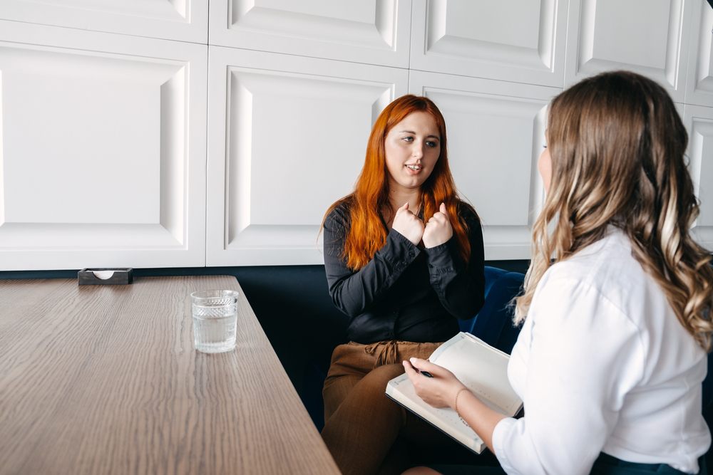 Holistic Counselling. Mental health concept. Communication session of woman psychologist and client. Psychotherapy or talk therapy as help people with variety of mental illnesses and emotional difficulties.